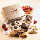 Dulcet gold gift tin with assorted chocolate brownies, blondies, chocolate-topped cookies, hamantaschen and rugelach, beautifully arranged with fresh strawberries.