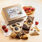 Dulcet gold Happy Birthday gift tin featuring a colorful cupcake and candle design, surrounded by assorted brownies, chocolate-topped cookies, blondies, hamantaschen, rugelach and fresh strawberries.