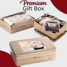 Dulcet premium Mother's Day gift box featuring elegant gold tins, a pink cupcake-themed greeting label, individually wrapped walnut brownies and assorted gourmet bakery treats.