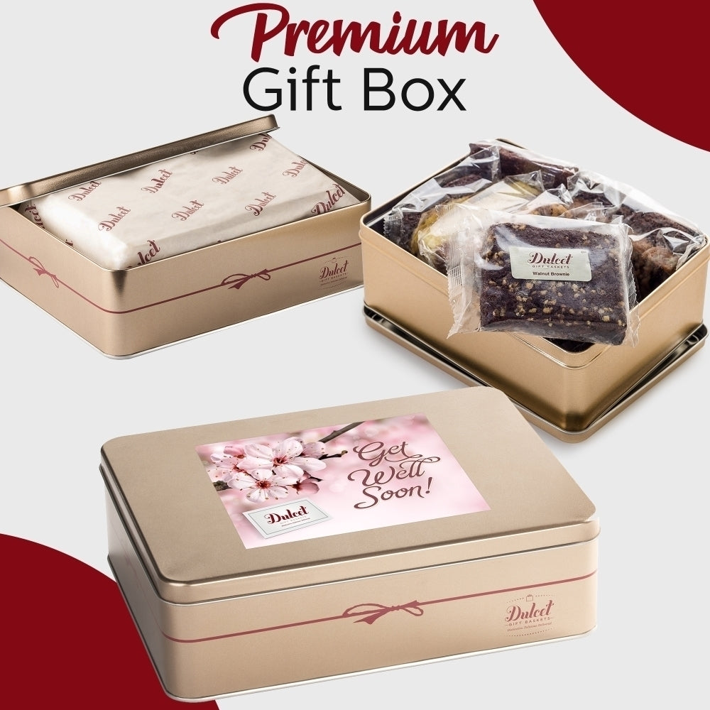Dulcet premium gold Get Well Soon gift tin featuring individually wrapped gourmet brownies, branded tissue paper, and a pink floral lid design.
