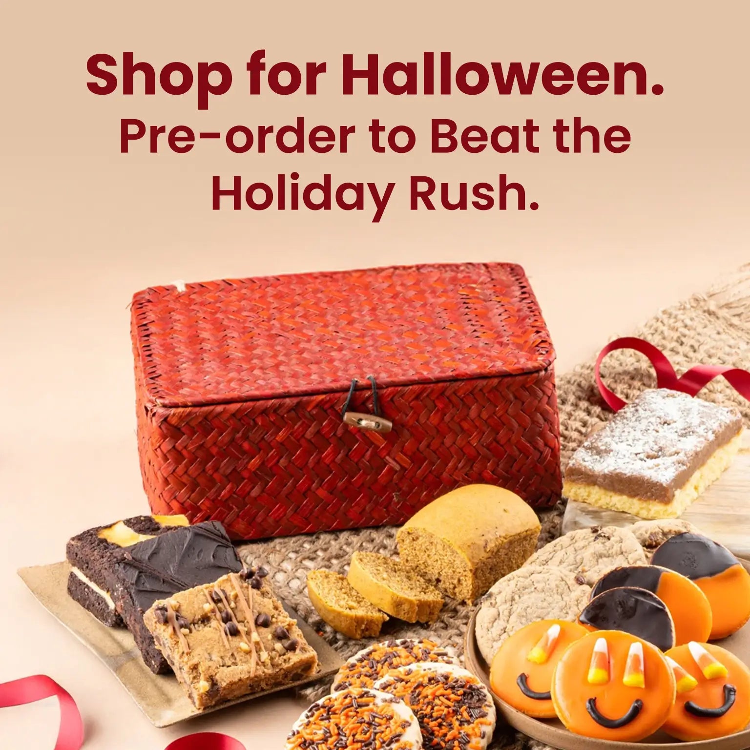 Dulcet Halloween gift basket promotion featuring a red woven basket, pumpkin cookies, brownies, fall pastries and seasonal treats with a holiday preorder message.