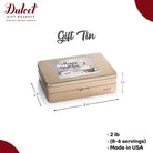 Dulcet gold birthday gift tin featuring a Happy Birthday cupcake lid design, measuring 8 x 6 x 3 inches, weighing 2 lb, and made in the USA.