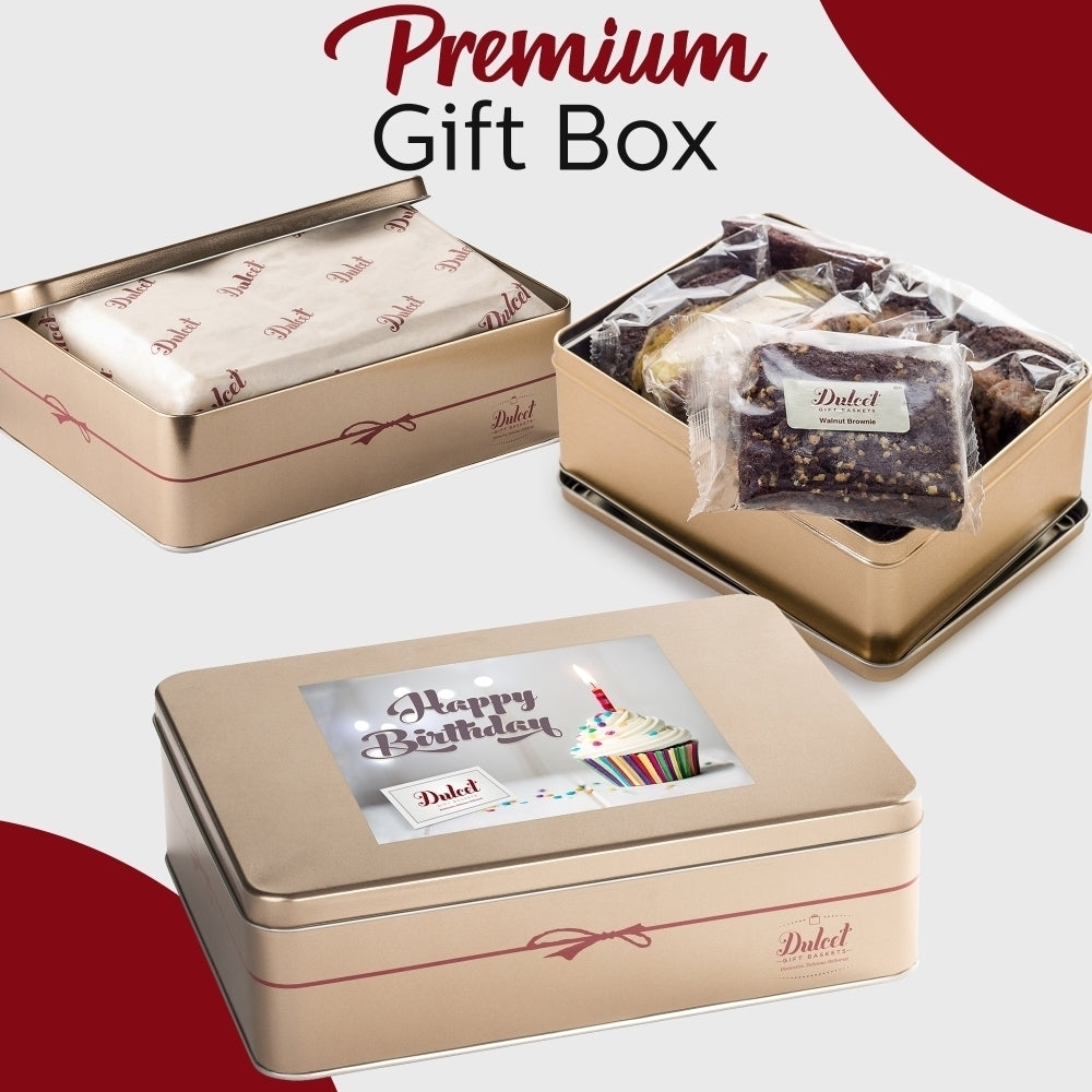 Dulcet premium gold birthday gift tin showcasing individually wrapped gourmet brownies, branded tissue paper, and a Happy Birthday lid featuring a decorated cupcake.