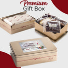 Dulcet premium gold birthday gift tin showcasing individually wrapped gourmet brownies, branded tissue paper, and a Happy Birthday lid featuring a decorated cupcake.