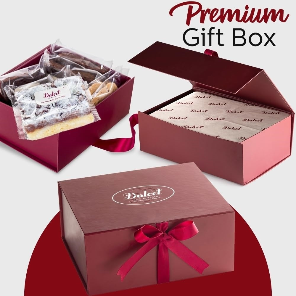 Premium Dulcet burgundy gift box featuring individually wrapped gourmet bakery treats, branded tissue paper, elegant hinged lid, and satin ribbon packaging.