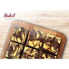 Dulcet chocolate cheesecake brownies featuring rich dark chocolate and creamy cheesecake swirls, cut into squares and arranged on a wooden serving board.