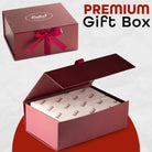Premium burgundy Dulcet gift box with elegant ribbon bow, magnetic-style lid and branded tissue paper, ideal for luxury and corporate gifting.