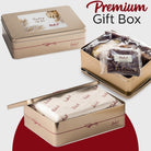 Premium Dulcet Thinking of You gift tin showing elegant gold packaging, individually wrapped gourmet brownies and assorted bakery treats.