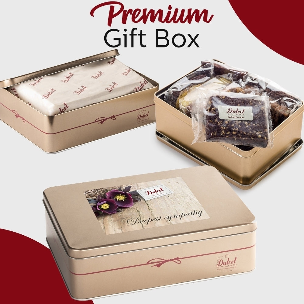 Dulcet premium sympathy gift tin with a Deepest Sympathy floral label, featuring individually wrapped gourmet brownies and bakery treats in an elegant gold tin.
