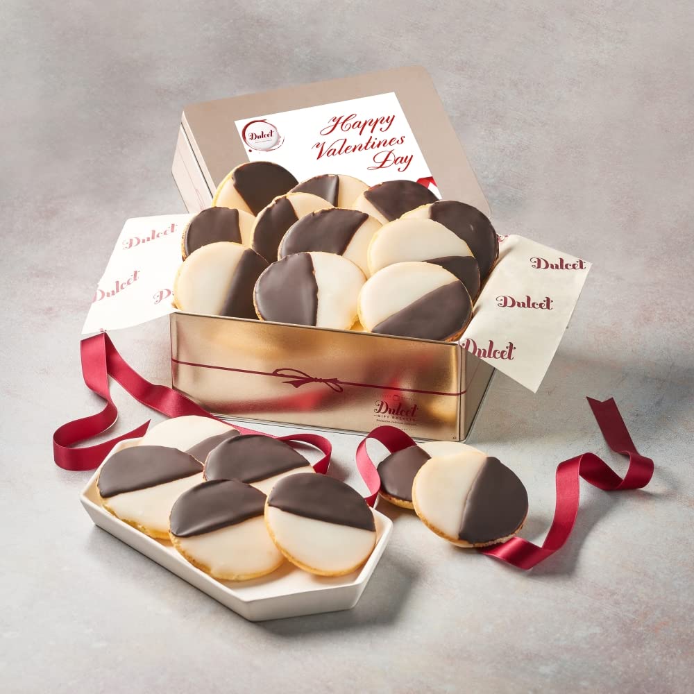 Dulcet Valentine's Day gold gift tin filled with chocolate and vanilla iced black and white cookies, featuring a Happy Valentine's Day lid and burgundy ribbon.