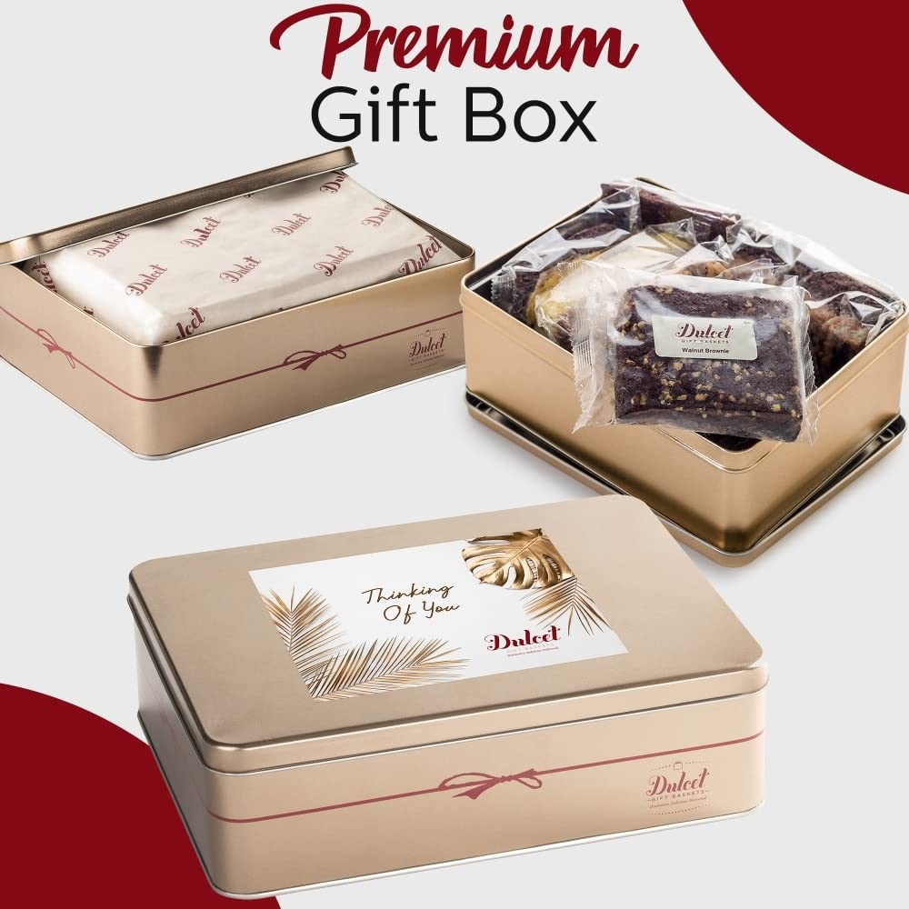 Dulcet Thinking of You gold gift tin displayed open with individually wrapped bakery treats and closed with a decorative leaf lid.